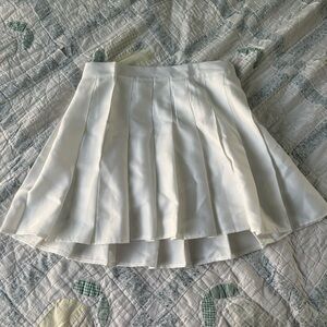 Pleated high waisted white skater skirt in white